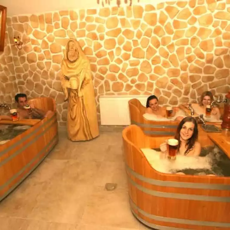 Group of people enjoying a private beer spa in Prague.
