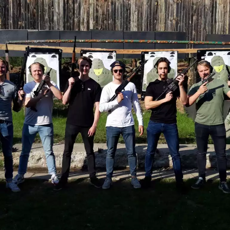 Group of friends on a gun range in Budapest.